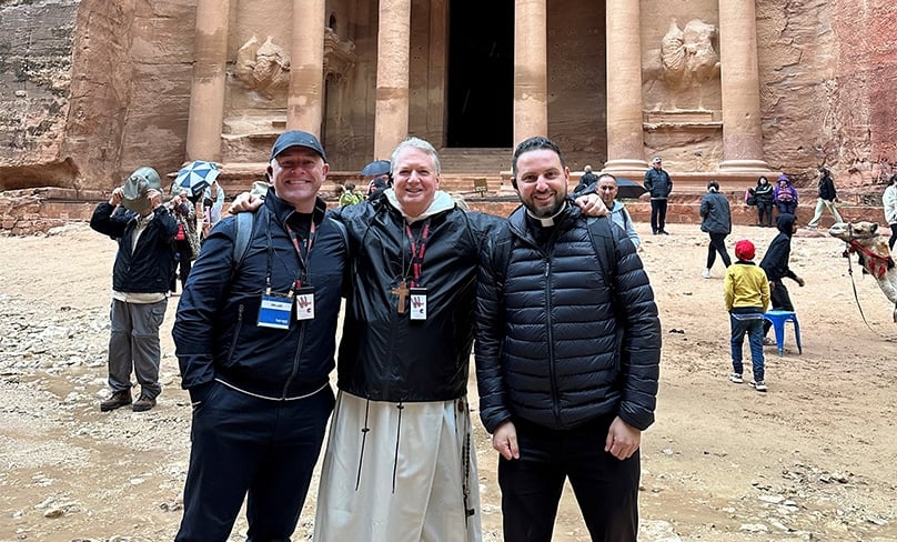 Archbishop Anthony Fisher OP at Petra in south-west Jordan with Catholic Schools NSW CEO Dallas McInerney and Fr Lewi Barakat while on Pilgrimage to the Holy Land. Photo: Supplied
