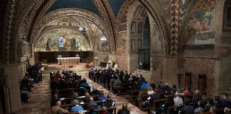 Participants in a Catholic Extension pilgrimage gather for Mass Nov. 18 in the lower Basilica of St. Francis in Assisi, Italy. Photo: CNS/Rich Kalonick, Catholic Extension