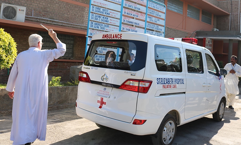 Fr Robert McCulloch blessing the palliative care ambulance van. Photo: Courtesy St Elizabeth's hospital Hyderabad
