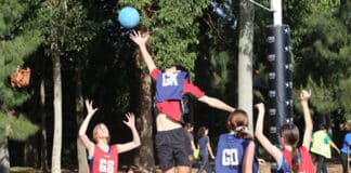 Ivy (Domremy Catholic College Five Dock), Noah El-Azzi (Marist College Eastwood), Claire (Domremy Catholic College Five Dock), Alia (Domremy Catholic College Five Dock) play mixed netball. Photo: Supplied