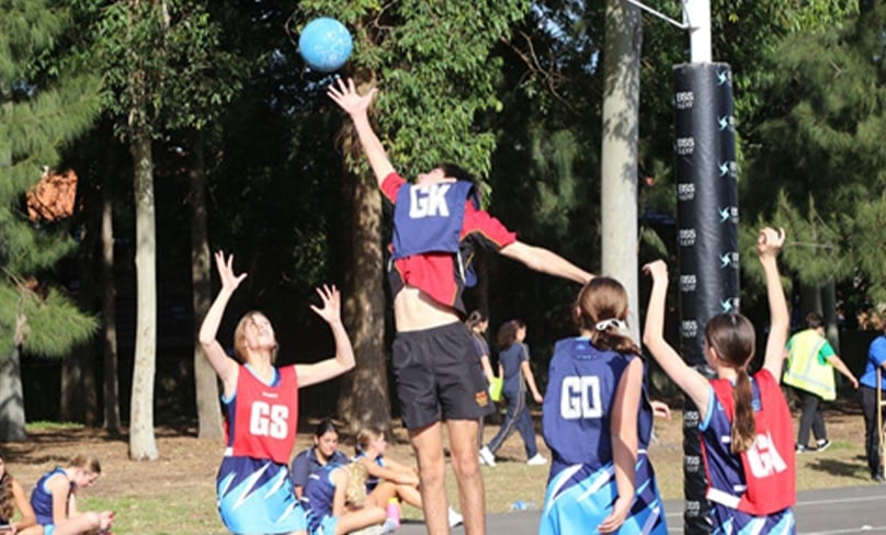 Ivy (Domremy Catholic College Five Dock), Noah El-Azzi (Marist College Eastwood), Claire (Domremy Catholic College Five Dock), Alia (Domremy Catholic College Five Dock) play mixed netball. Photo: Supplied