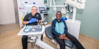 Dr Robert Aslan with his “patient” Fr Richard Ddumba, who will celebrate the first anniversary Mass for the surgery on 13 June. Photo: Giovanni Portelli