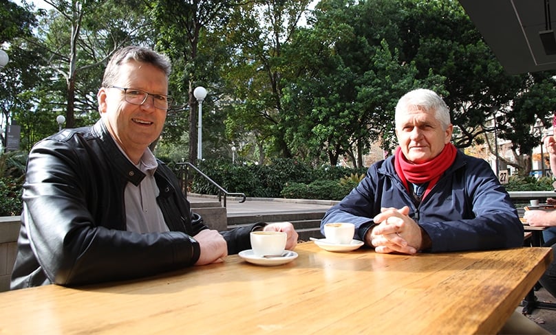 Tim Paul, left, with Kevin Smith who introduced a Calix unit to the Archdiocese of Sydney, right. Photo: Supplied