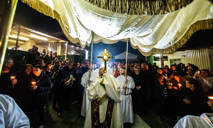 The candlelit procession began at 7pm after evening prayers at St John the Beloved church in Greenacre with Fr Ibrahim Sultan and Melkite Bishop Robert Rabbat. Photo: Giovanni Portelli