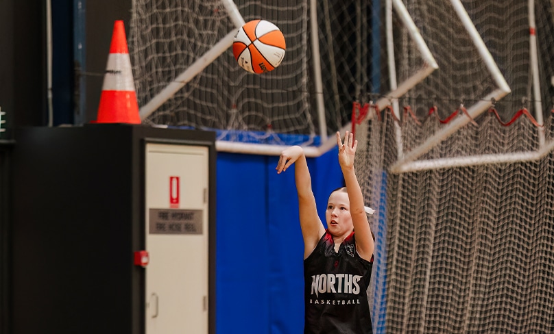 After three months of learning to walk again in the pool, Sienna is now entering her third year of representative basketball for North Bears and has also been selected into the Mackillop Girls Basketball team. Photo: Patrick Lee