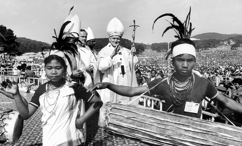 Local youths perform a song as Pope John Paul II visits Shillong in India in 1986. Photo: CNS