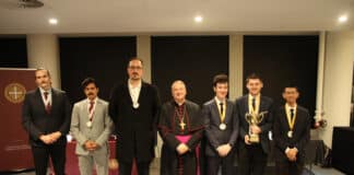 Campion at left, and UNDA at right, with Archbishop Anthony Fisher OP. Photo: Adam Wesselinoff