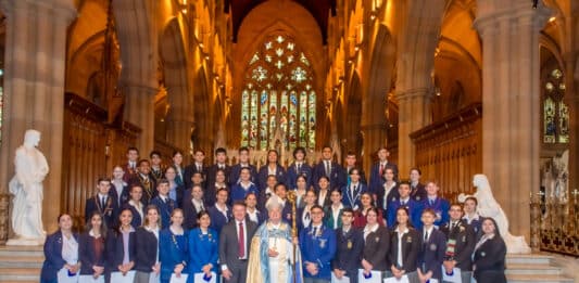 Archbishop Anthony Fisher OP and Sydney Catholic Schools’ Executive Director, Tony Farley with the recipients of the 2023 Archbishop’s Awards for Student Excellence. Photo: Giovanni Portelli