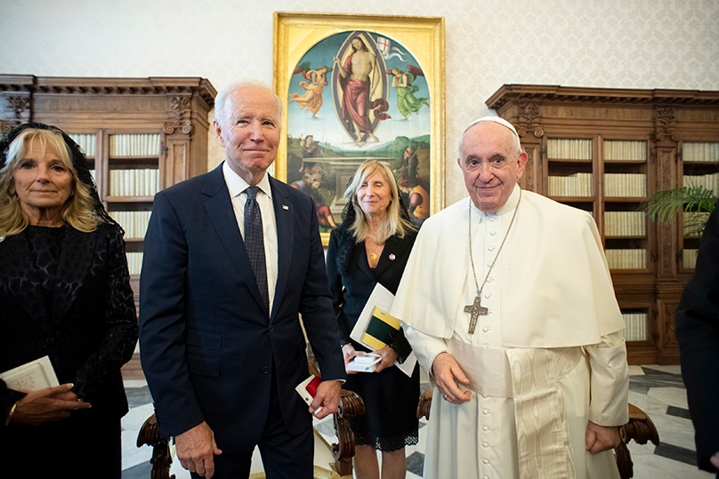 U.S. President Joe Biden, accompanied by his wife, Jill, is pictured with Pope Francis during a meeting at the Vatican in October 2021. Photo: CNS photo/Vatican Media