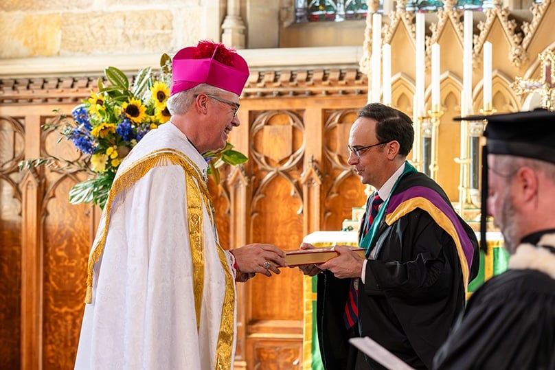 Dr Mark Schembri was installed as the 21st rector of St John’s College at the University of Sydney in a ceremony celebrated by Auxiliary Bishop Richard Umbers. Photo: Patrick Lee/St John’s College