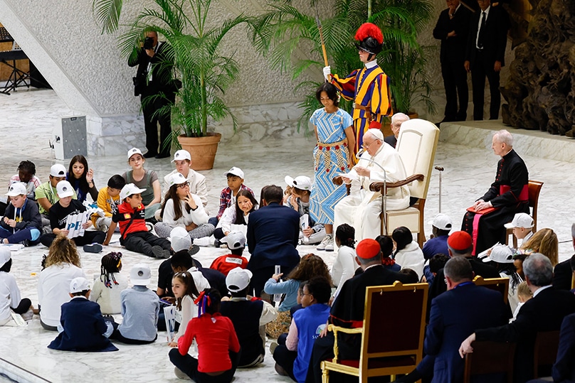 Pope Francis speaks to children from different parts of the world at the "Let Us Learn from Boys and Girls" event in the Paul VI hall at the Vatican on 6 November. Photo: CNS photo/Lola Gomez