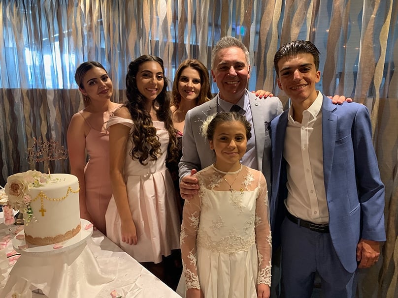 Guy Zangari and family celebrate his youngest daughter’s first Holy Communion. Photo: Supplied