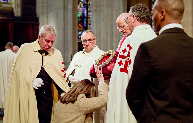 The Crown of Thorns, pictured being venerated during a Good Friday service, would have been destroyed if not for the bravery of many during the Notre Dame Cathedral fire. Photo: Courtesy of Netflix