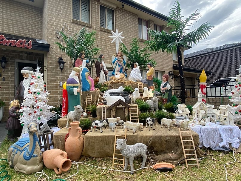 Mariette Ndaira’ proudly displays a Nativity themed Christmas scene in her front yard in the inner west of Sydney. Photo Darren Ally