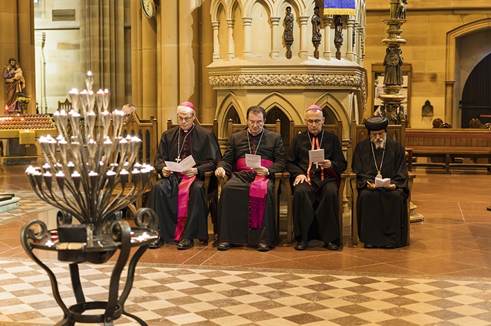 Auxiliary Bishop Richard Umbers, Bishop Antoine-Charbel Tarabay from the Maronite Eparchy, Archbishop Amel Nona from the Chaldean Catholic Diocese and Bishop Daniel from the Coptic Orthodox Church. At the interfaith prayer service at St Mary’s Cathedral. Photo: Patrick Lee/Catholic Weekly