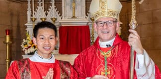 Deacon Hien Vu with Bishop Anthony Randazzo. Photo: Giovanni Portelli