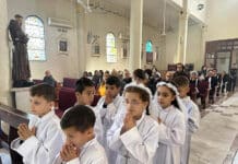 On 7 January 2024, the feast of Epiphany, children process to front of the Holy Family Church in Gaza City for their first Communion. Photo: OSV News photo/courtesy Latin Patriarchate of Jerusalem