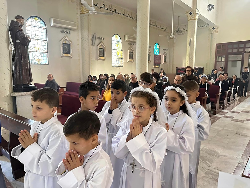 On 7 January 2024, the feast of Epiphany, children process to front of the Holy Family Church in Gaza City for their first Communion. Photo: OSV News photo/courtesy Latin Patriarchate of Jerusalem