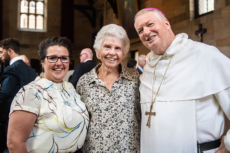 St Mary’s Cathedral College Principal Kerrie McDiarmid and former student Patricia Sumner celebrate the school’s Bicentenary with Archbishop Anthony Fisher OP. Photo: Giovanni Portelli