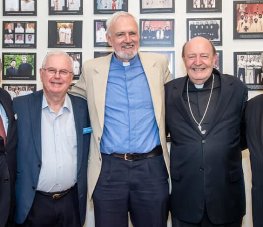 Archbishop Julian Porteous, second from right, was one of 15 priests celebrating significant milestones. Photo: Giovanni Portelli