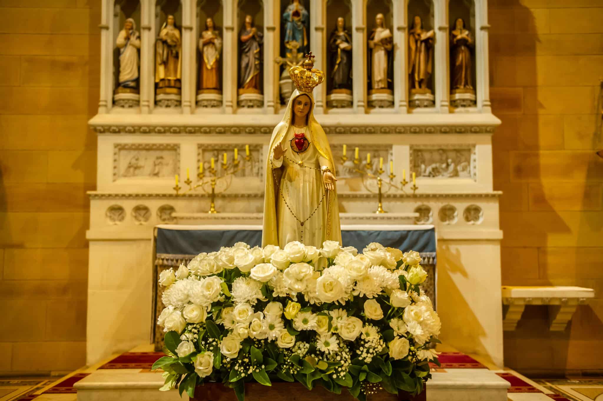 Our Lady of Fatima procession invites faithful to share the flame  